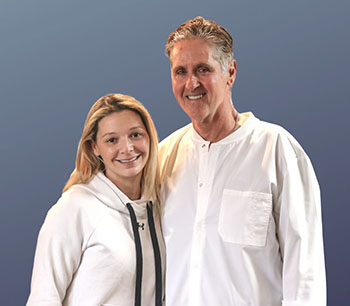 Dr. Richard Pape with one of his dental implant patients.